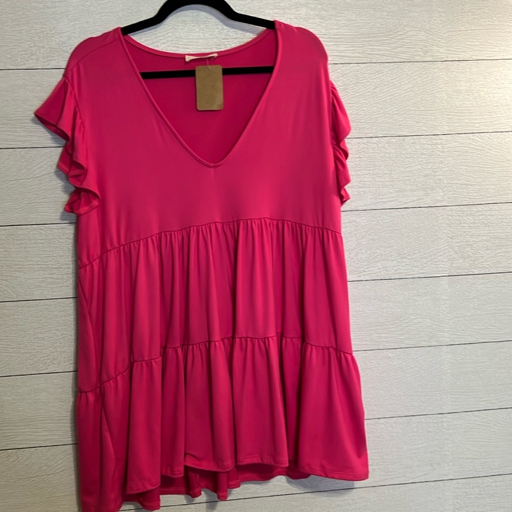 Entro Ruffle Top NWT
Size: XL
Material: 96% Polyester, 4% Spandex